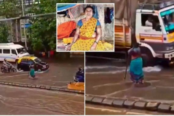 Salut, Wanita Paruh Baya Ini Berjibaku Mengatur Kendaraan Saat Hujan dan Banjir di Jalan Raya - JPNN.COM