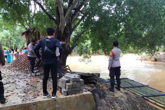 Tarmiji ASN Hilang Tenggelam saat Menyeberang Sungai Amandit - JPNN.COM