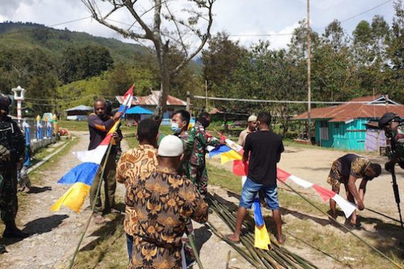 Begini Cara Satgas TNI Yonif 751 Menumbuhkan Rasa Nasionalisme Bagi Pemuda Papua - JPNN.COM