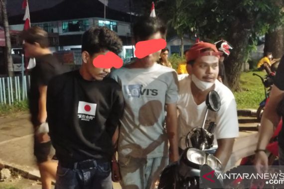 Razia Balap Liar, Polisi Tangkap Remaja Bawa 2 Paket Ganja - JPNN.COM