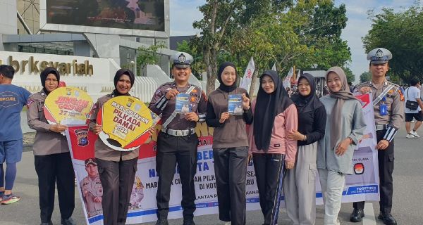 Satlantas Polresta Pekanbaru Amankan CFD Sekaligus Sosialisasi Pilkada Damai - JPNN.com